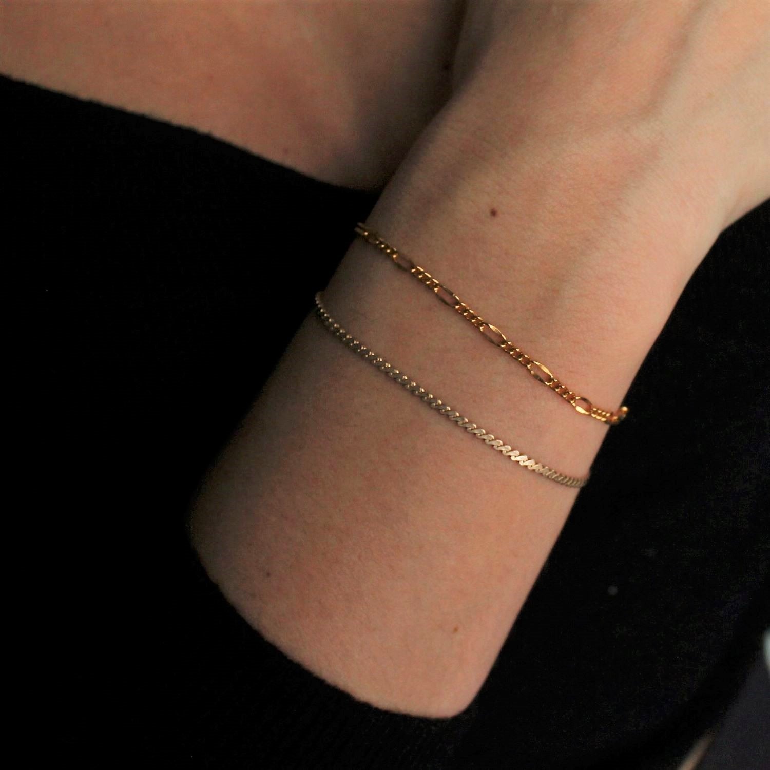 Luxury Serpentine Bracelet with polished green gemstone design for elegant women’s fashion jewelry. - RoshelLuxe.com