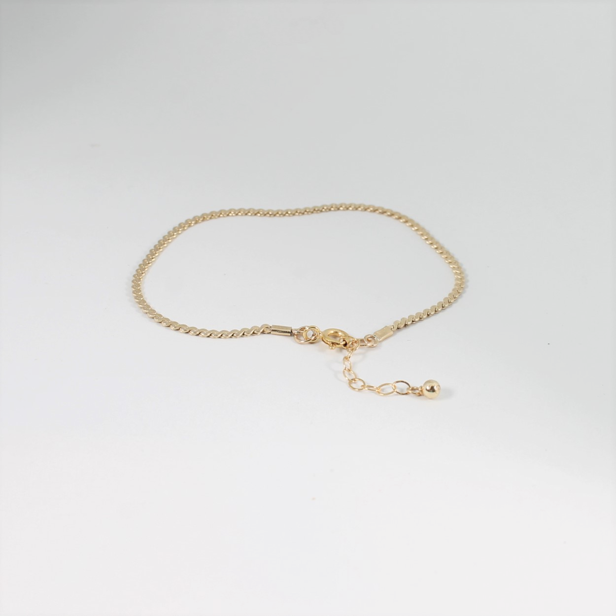 Luxury Serpentine Bracelet with polished green gemstone design for elegant women’s fashion jewelry. - RoshelLuxe.com