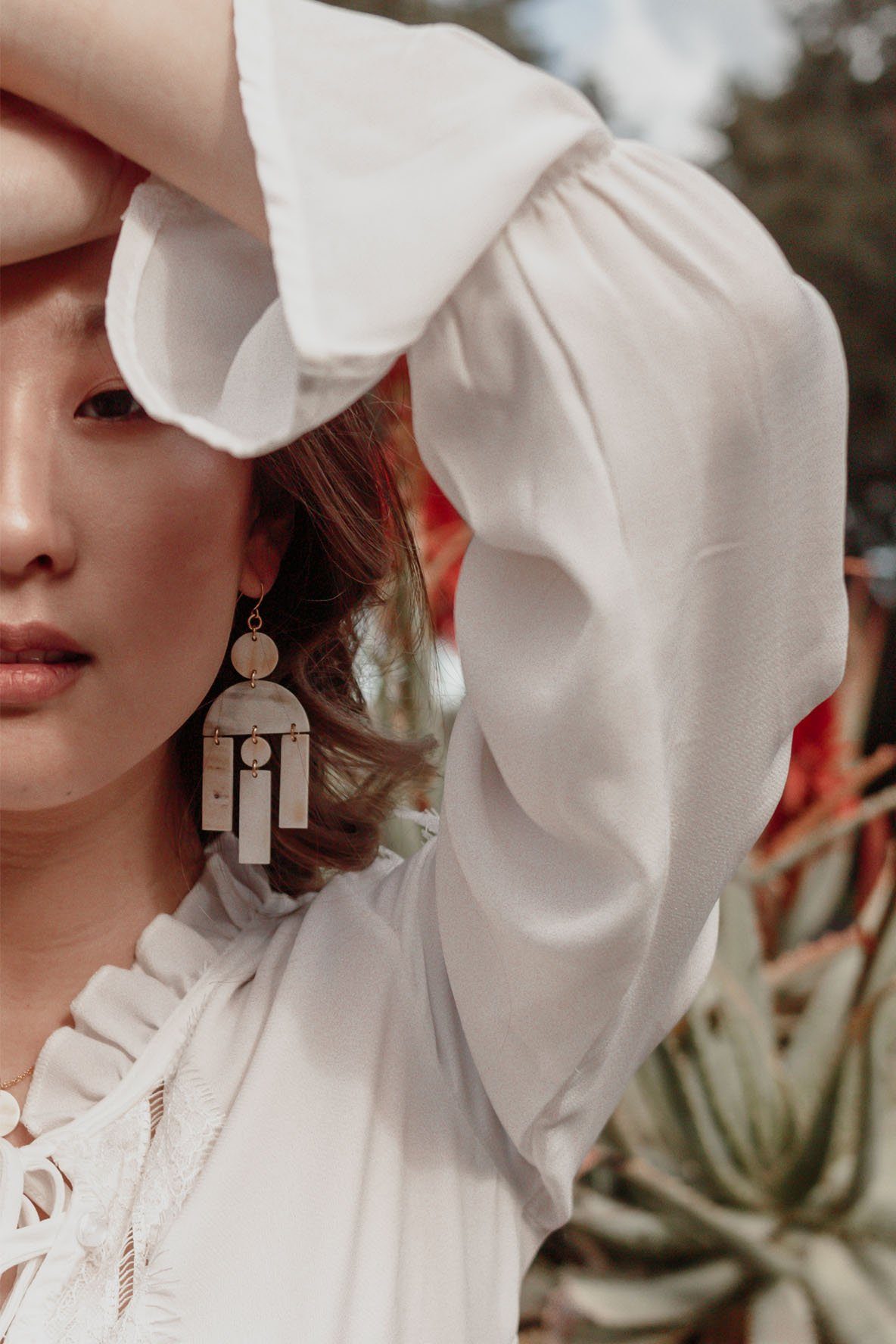 Hoang Hau Buffalo Horn Chandelier Statement Earrings - RoshelLuxe.com